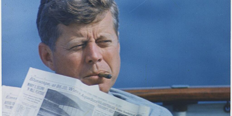 JFK smoking a cigar